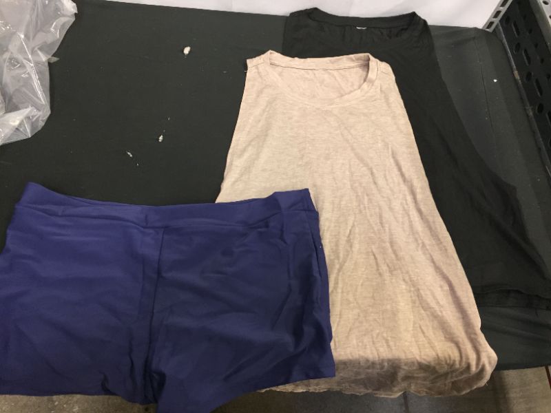 Photo 1 of WOMENS TWO MEDIUM TAN AND BLACK ATHLETIC TANK TOPS AND MEDIUM NAVY BLUE ATHLETIC SHORTS