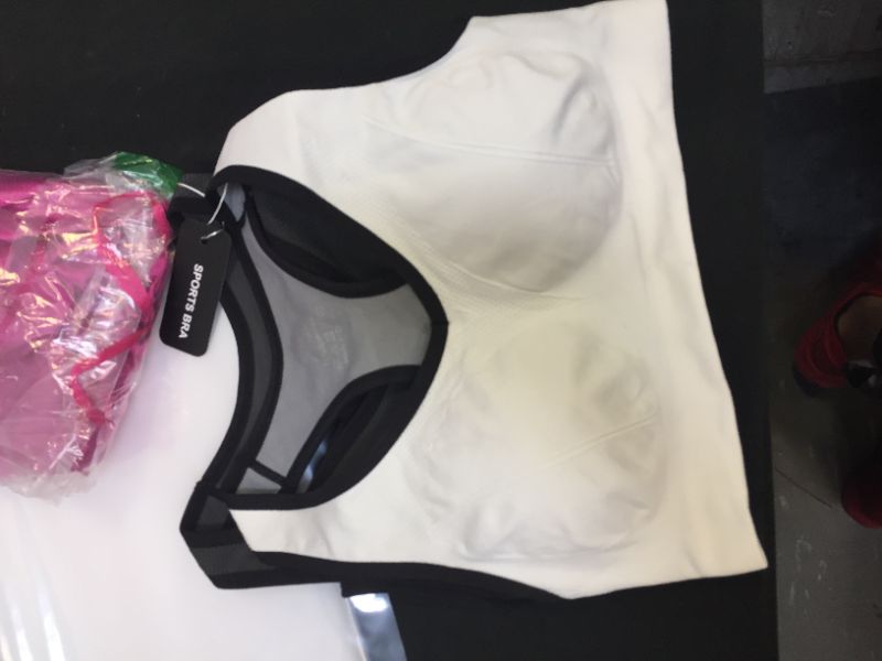 Photo 1 of MEDIUM 3 PACK OF SPORTS BRAS 