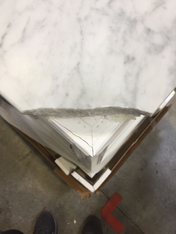 Photo 1 of 30 in. W x 22 in. D x 34 in. H Bath Vanity in White with Marble Vanity Top in Carrara White with White Basin
