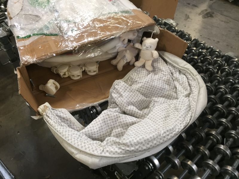 Photo 1 of Delta Children Deluxe Gliding Bassinet, Silver Lining