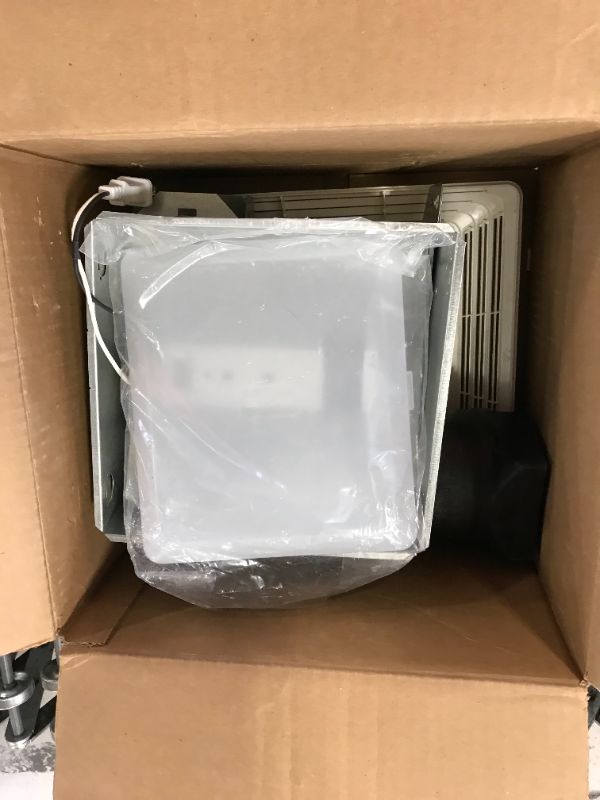 Photo 1 of Broan-NuTone 50 CFM Ceiling Bathroom Exhaust Fan with Light