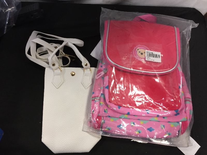 Photo 1 of 2 bag lots misc items sold as is baby backpack and white purse 