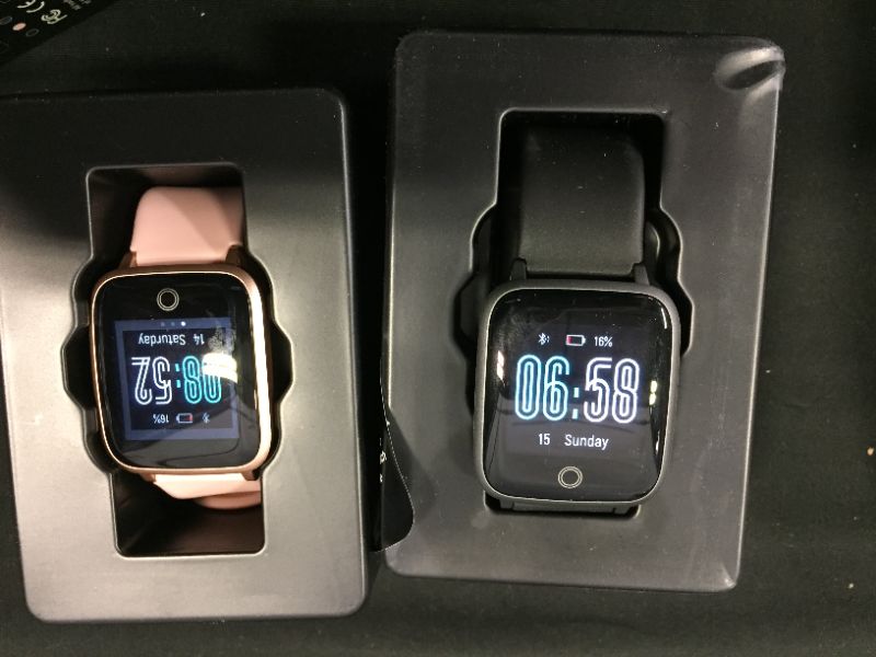 Photo 1 of 2 pack smart watches pink and black USED needs to be charged 