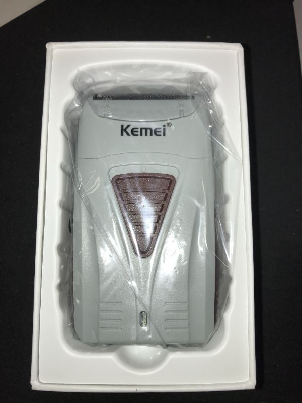 Photo 1 of KEMEI RECIPROCATING ELECTRIC SHAVER TITANIUM FOIL METAL TOOL HEAD KM-3382