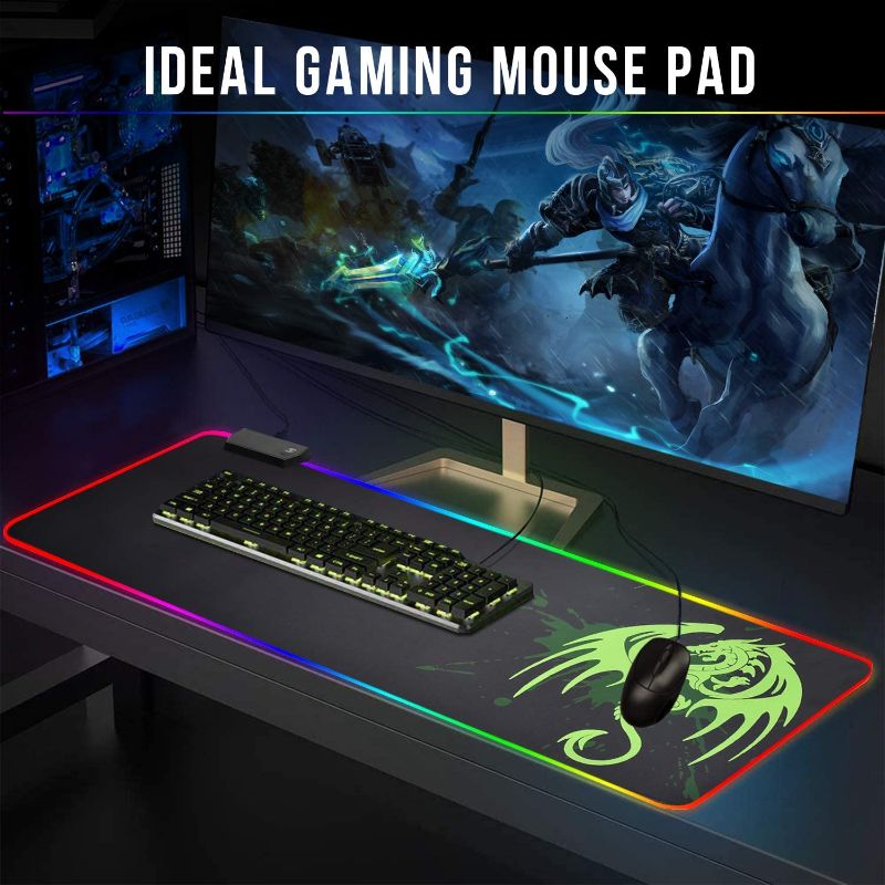 Photo 1 of  Gaming Mouse Pad, Large Extended Soft Led Mouse Mat with 14 Lighting Modes 2 Brightness Levels, Non-Slip Rubber Base, Waterproof Surface, Keyboard Mousepad (31.5 x 11.8 x 0.2 Inch) 
PICTURE FOR LIKELINESS NO DRAGON ON MATT
