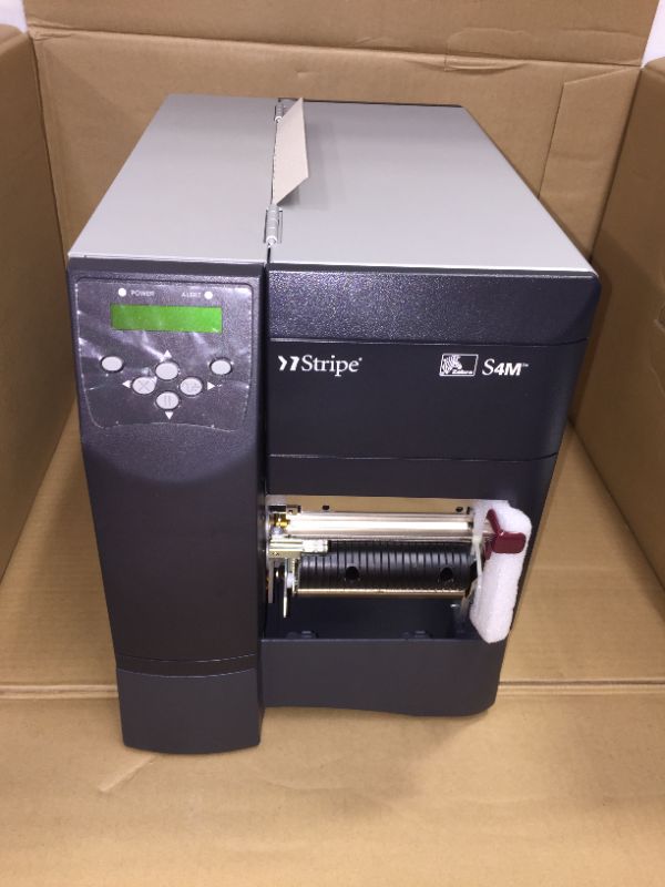 Photo 1 of Zebra S4M Direct Thermal Label Printer with USB, Serial and Parallel Ports, 6 in/s Print Speed, 203 dpi Print Resolution, 4.09" Print Width, 110/220 VAC