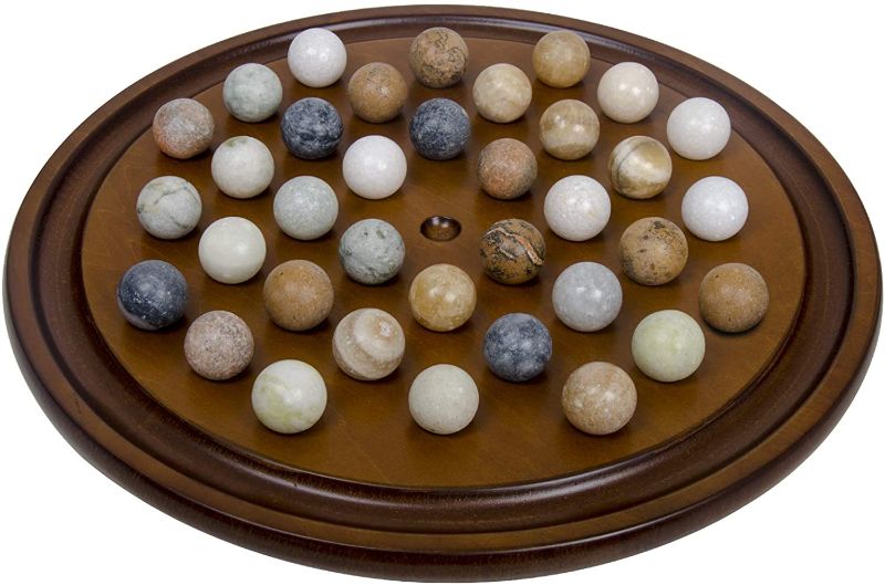 Photo 1 of Mahogany Wooden Finish Authentic Handmade Solitaire Board Game Set with 36 Natural Marbles, for Ages 12 & up.
