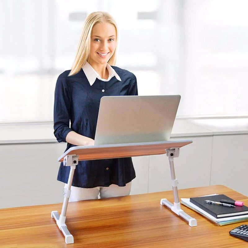 Photo 1 of Amazon Basics Adjustable Laptop Tray Table - Lap Desk Fits 17-Inch Laptop - Large
