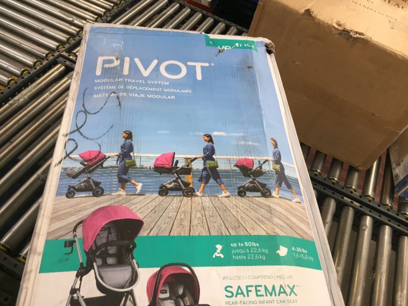 Photo 1 of Evenflo Pivot Modular Travel System with SafeMax Infant Car Seat - Dusty Rose