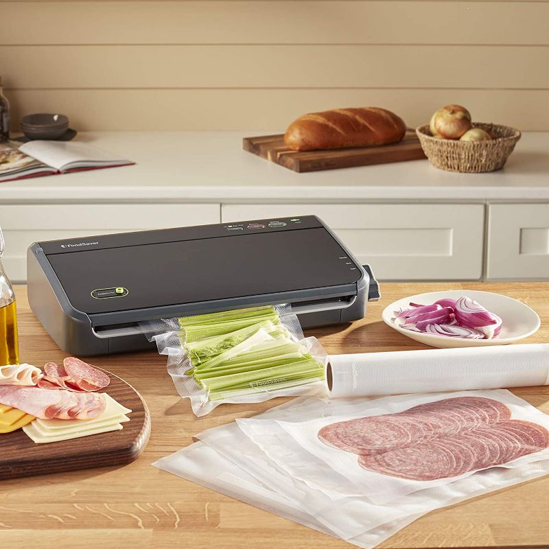 Photo 1 of FoodSaver FM2100-000 Vacuum Sealer Machine System with Starter Bags & Rolls | Safety Certified, Black

