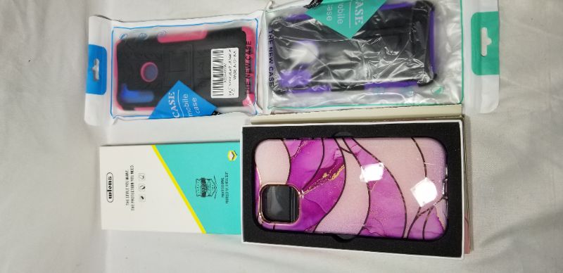 Photo 1 of MISCELLANEOUS ITEMS: (VARIOUS PHONE CASES)