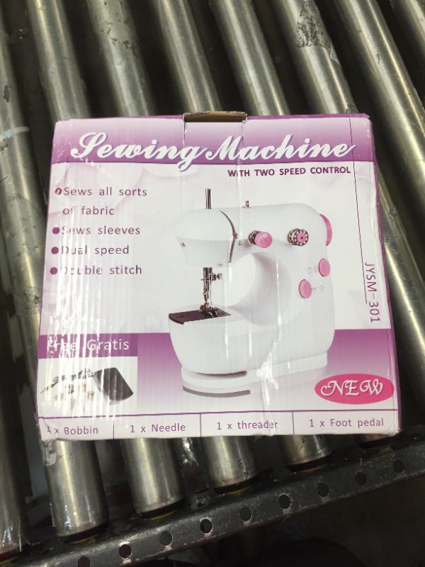 Photo 1 of GENERIC PINK SEWING MACHINE