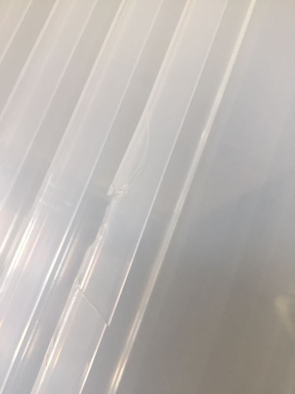 Photo 2 of  12 pack of clear storage bins with lids, 1 cracked on side