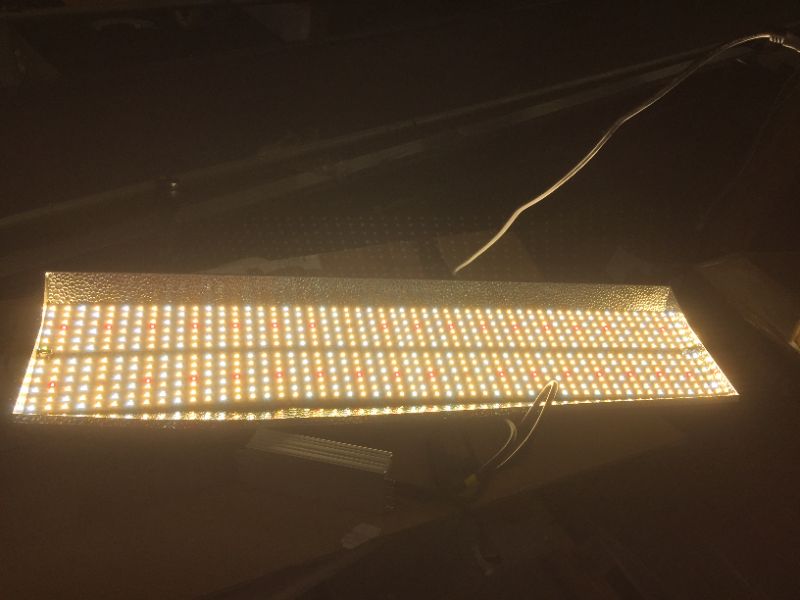 Photo 3 of MARS HYDRO TSL 2000W Led Grow Light Daisy Chain Dimmable 2x4ft 3x5ft Full Spectrum Grow Light for Indoor Plants Veg Bloom Light with 684pcs LEDs...silver backing is bent in multiple places but lights still work perfectly
