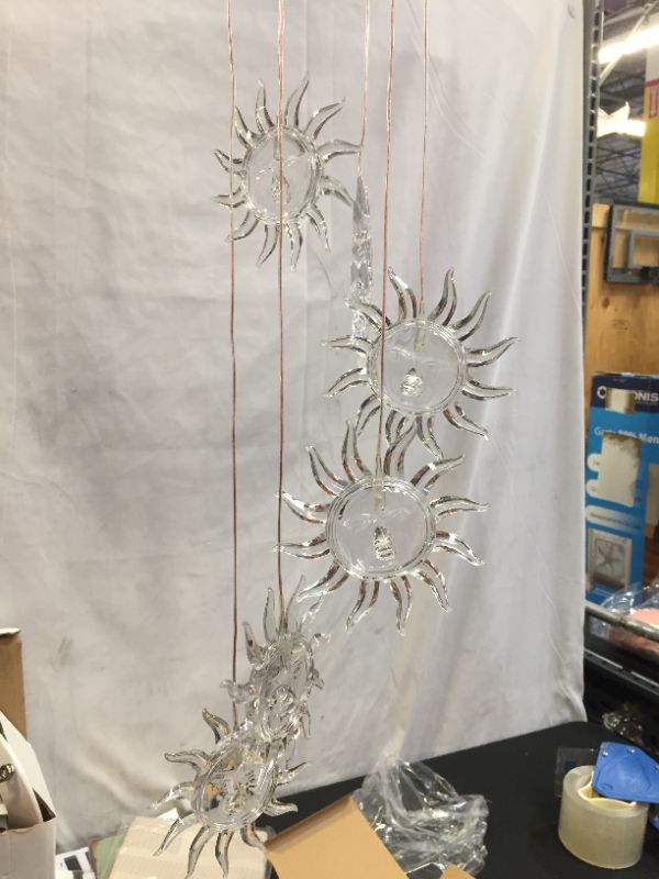 Photo 1 of BXGTECH Solar Sun Wind Chimes  LED Hanging Wind Chime with Hook Solar Powered and USB Charging Outside Garden Yard Patio Outdoor Decor
