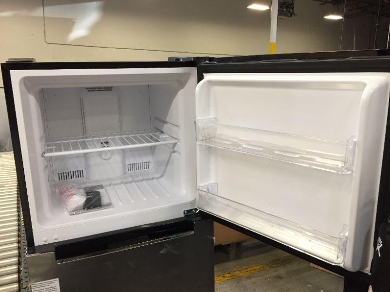 Photo 4 of 10.1 cu. ft. Top Freezer Refrigerator in Platinum Steel - MINOR DENTS - DIRTY 
