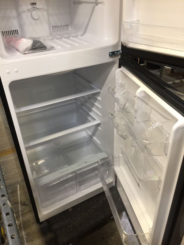 Photo 3 of 10.1 cu. ft. Top Freezer Refrigerator in Platinum Steel - MINOR DENTS - DIRTY 
