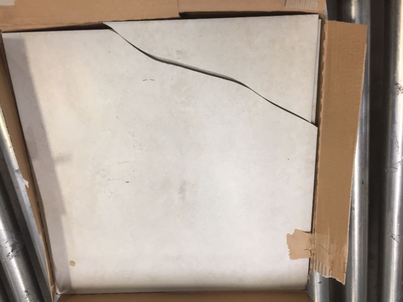 Photo 3 of  32 BOXES OF Montefino Beige 18 in. x 18 in. Matte Porcelain Floor and Wall Tile (15.75 sq. ft./7 Tile per box) CALIBER:TONE = C5-T29,  VARYING CONDITION. SOME TILE BROKEN SOME INTACT. ROUGHTLY 80% OF TILE USABLE 
