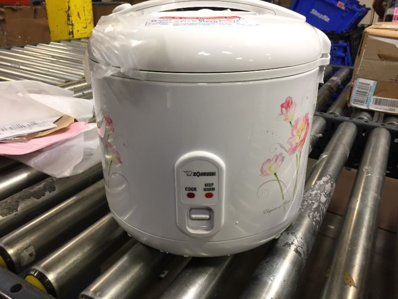Photo 2 of Zojirushi 10-Cup Automatic Rice Cooker & Warmer - Tulip
 VERY CLEAN, LIGHT TURNS ON 