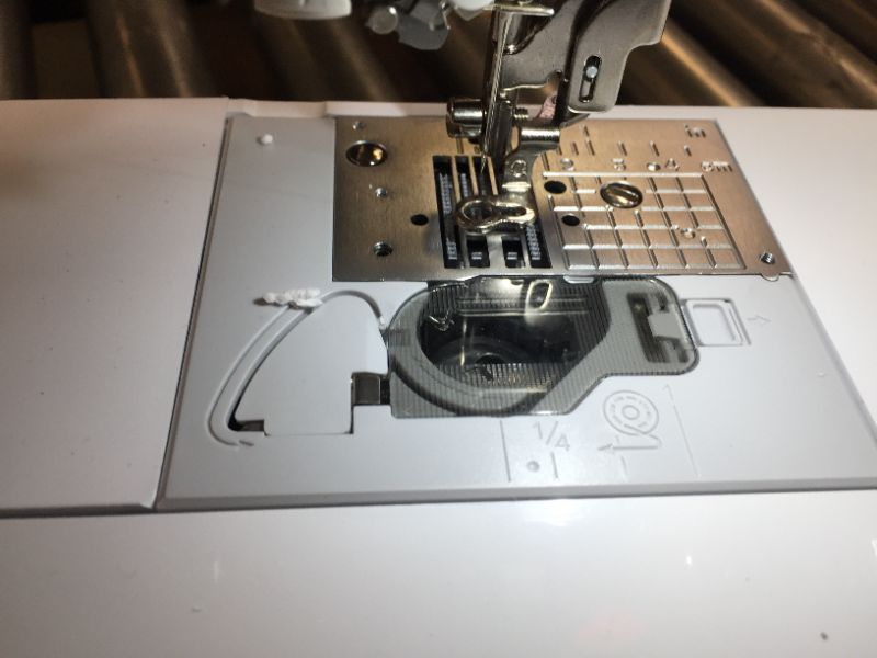 Photo 4 of 240-Stitch Sewing and Embroidery Machine, MINOR SCUFFS AND SCRAPES, TURNS ON /UNAWARE IF PIECS MISSING. 