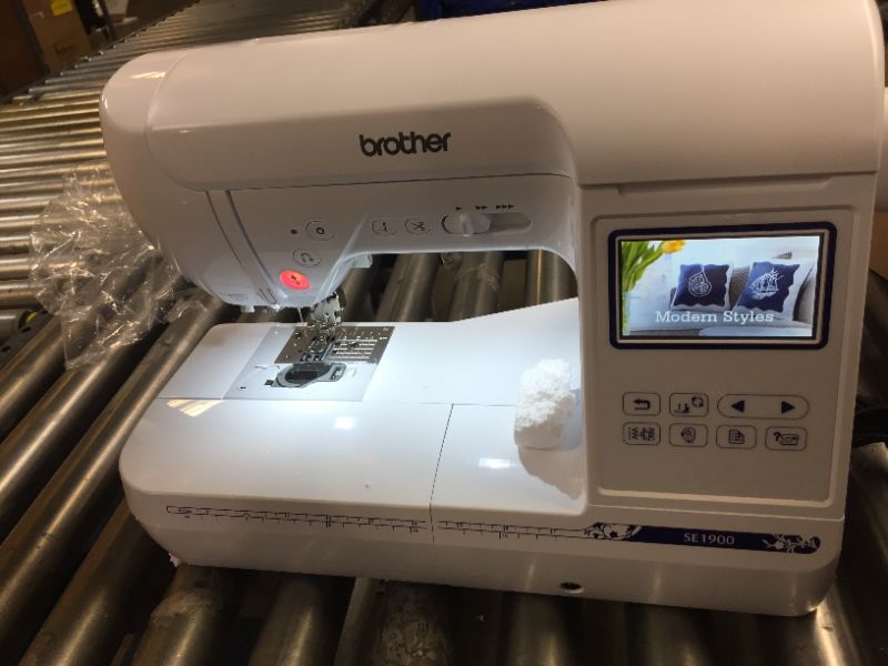 Photo 2 of 240-Stitch Sewing and Embroidery Machine, MINOR SCUFFS AND SCRAPES, TURNS ON /UNAWARE IF PIECS MISSING. 