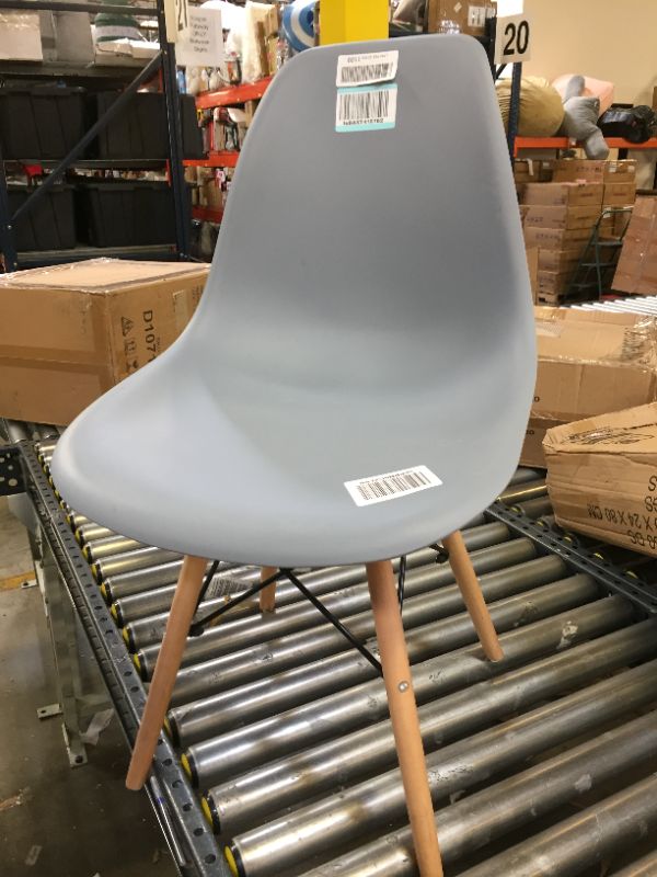 Photo 1 of GRAY PLASTIC CHAIR WITH WOODEN LEGS/ 32 INCHES TALL