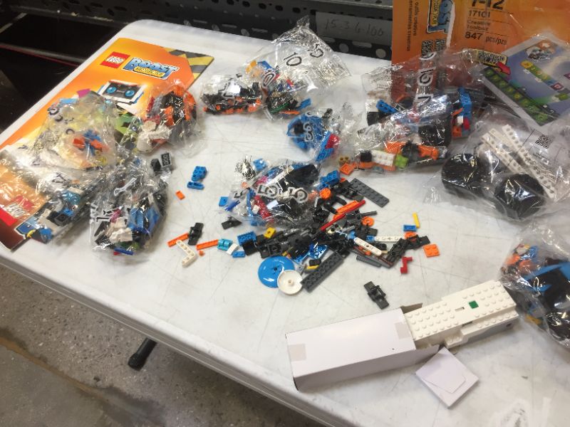 Photo 3 of  lego bags opened scattered in box----LEGO Boost Creative Toolbox 17101 Fun Robot Building Set and Educational Coding Kit for Kids, Award-Winning STEM Learning Toy (847 Pieces) Frustration-Free Packaging