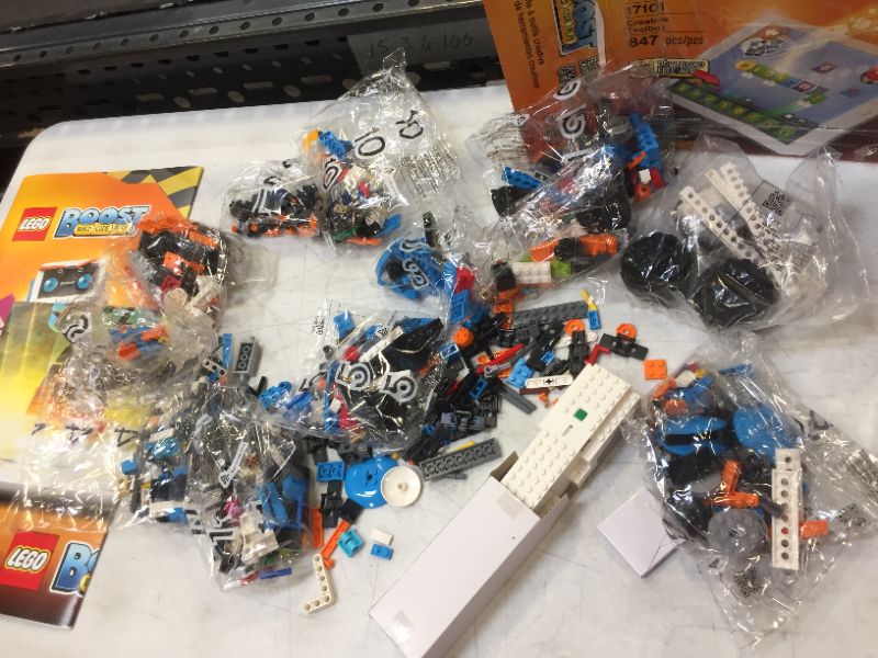 Photo 2 of  lego bags opened scattered in box----LEGO Boost Creative Toolbox 17101 Fun Robot Building Set and Educational Coding Kit for Kids, Award-Winning STEM Learning Toy (847 Pieces) Frustration-Free Packaging