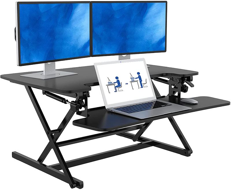 Photo 1 of FLEXISPOT Height Adjustable Standing Desk Converter | 35 inch Stand Up Desk Riser, Black Home Office Desk Workstation for Dual Monitors and Laptop
