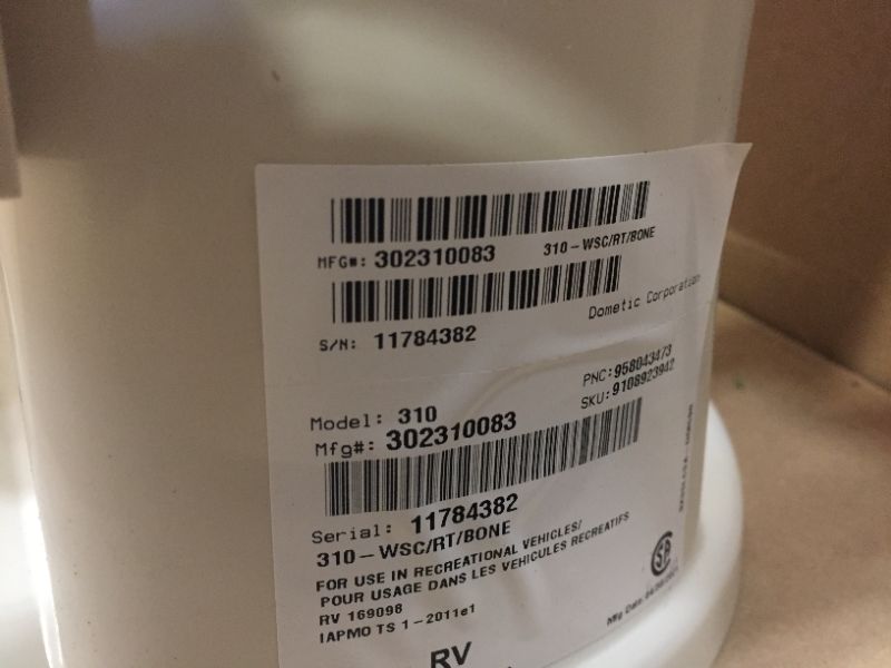 Photo 1 of Dometic 302310083 310 Series Standard Height RV Toilet 18" Height, Slow Close Wood Seat, Bone