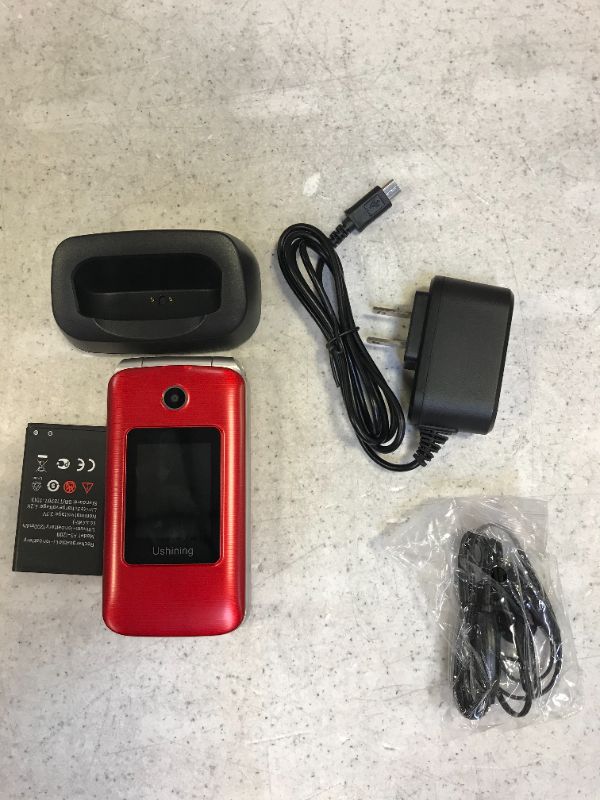 Photo 2 of Ushining Senior Flip Phone Unlocked 3G SOS Big Button Unlocked T Mobile Flip Phone 2.8" LCD and Large Keypad Basic Cell Phone with Charging Cradle for Seniors & Kids(Red)
