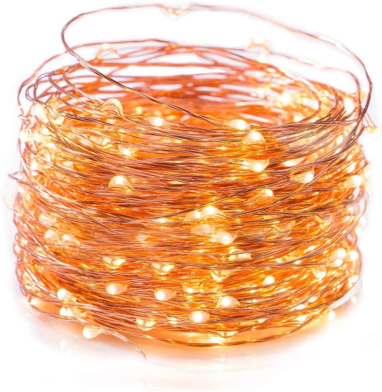Photo 1 of Fairy String Lights Plug in , 39 Feet 120 LED Copper Wire Firefly Lights for Bedroom Wedding Gathering Party Christmas Tree Garland Wreath Decoration, Warm White
