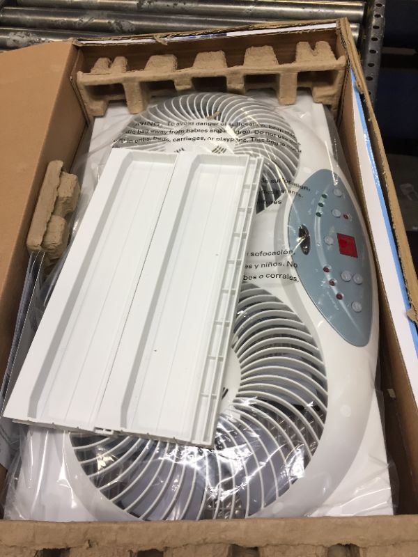 Photo 2 of Bionaire BW2300-N Twin Reversible Airflow Window Fan with Remote Control
