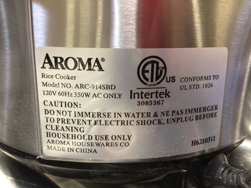 Photo 4 of Aroma Digital Rice Cooker and Food Steamer, Silver, 8 Cup
**HAS A DENT ON THE BACK**