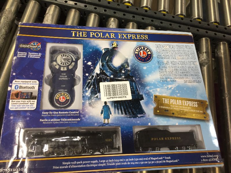Photo 1 of Lionel The Polar Express, Electric HO Gauge, Model Train Set w/ Remote and Bluetooth Capability + 4 Additional Pieces of 20" Radius Straight + 4 Radius Curve MagneLock Track