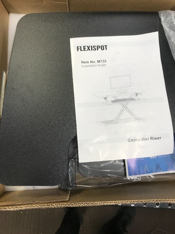 Photo 1 of FLEXISPOT 32 inch Standing Desk Converter | Height Adjustable Stand Up Desk Riser, Black Home Office Desk Workstation for Dual Monitors and Laptop M732

