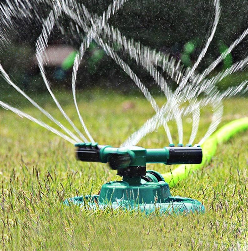 Photo 1 of 360-Degree 3 Arm Rotating Lawn Sprinkler