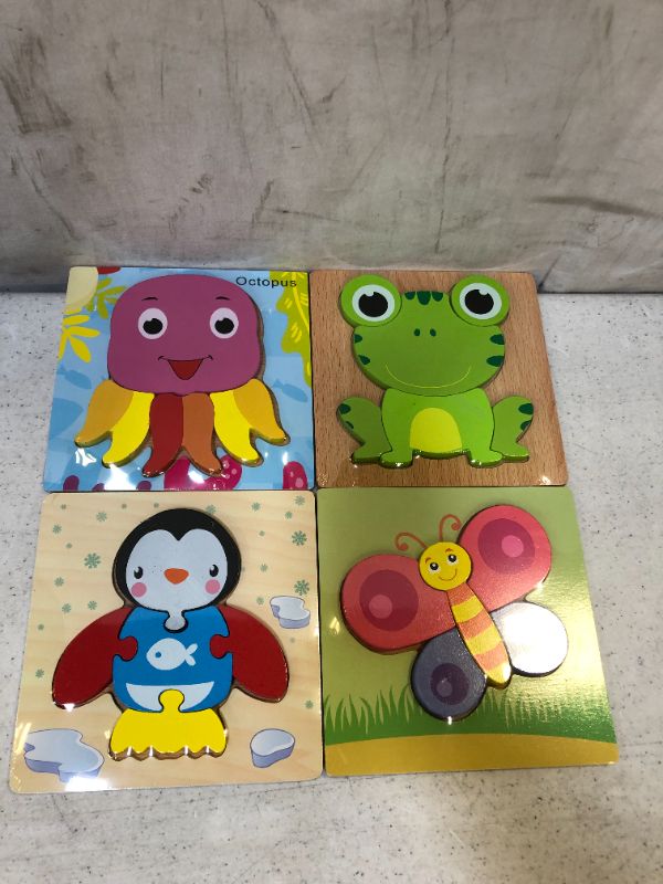 Photo 1 of WOODEN ANIMAL TOY PUZZLE 