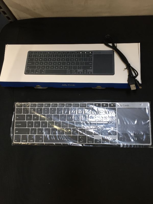 Photo 1 of JELLY COMB DEVICE FOR BLUETOOTH KEYBOARD WITH TOUCH PAD FOR MAC BLACK