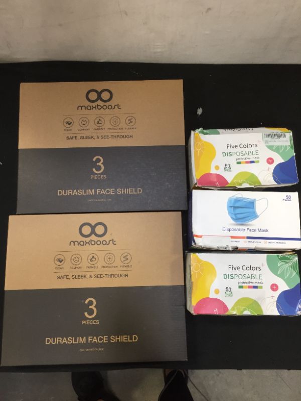 Photo 1 of 2 BOXES MULTICOLOR DISPOSABLE FACE MASK AND DISPOSABLE BLUE MASKS 50CT EACH BOX AND 2 BOX FACE SHEILD 3CT EACH BOX