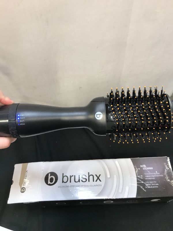 Photo 1 of brushx - salon one-step hair dryer and volumizer ( was plugged in and turned on ) ( has a little hair in item from previous use ) 