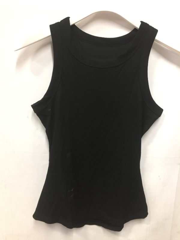 Photo 1 of Black women's tank top - size unknown but looks like an M - has stains 