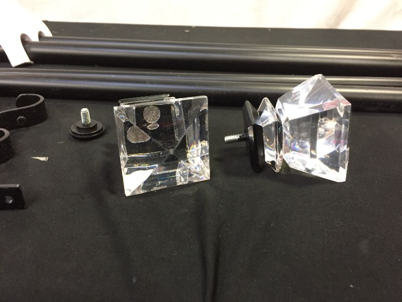 Photo 1 of Curtain rod(size unknown)
