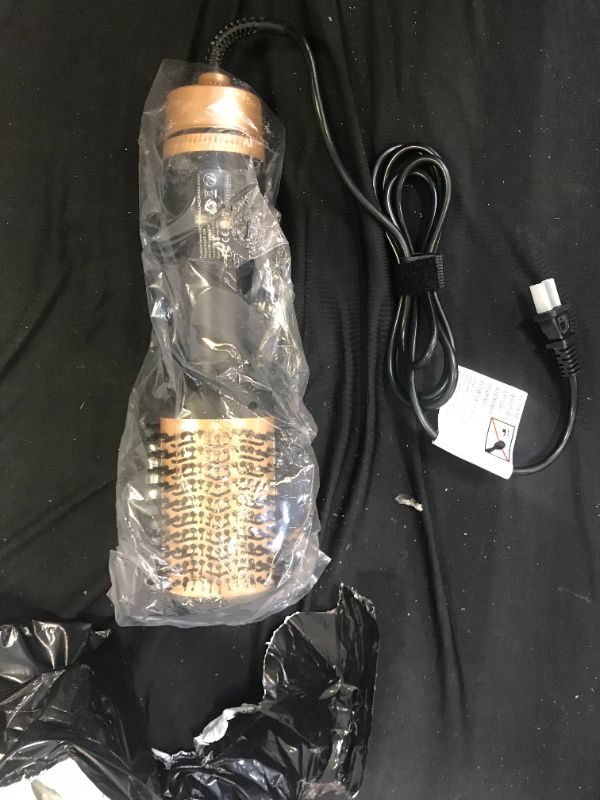 Photo 1 of 1200W 2-In-1 One-Step Hair Dryer and Volumizer Hot Air Brush Hair Straightening Curling Electric Comb
