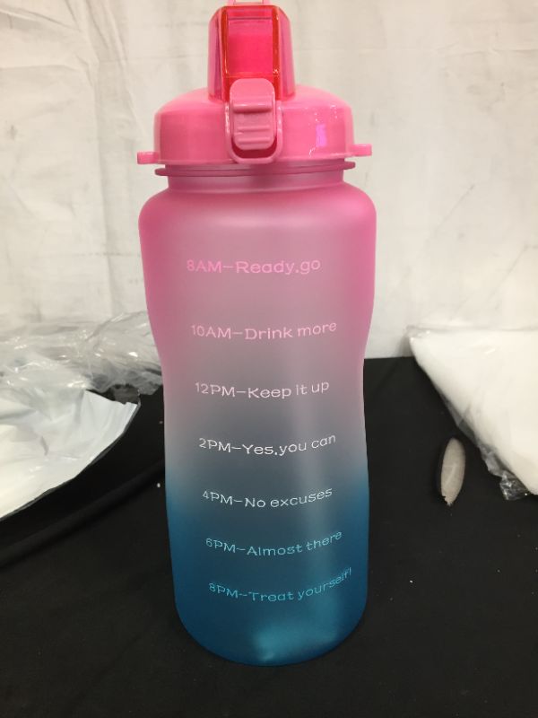 Photo 1 of 2 pack of Motivational Gallon water bottle pink green