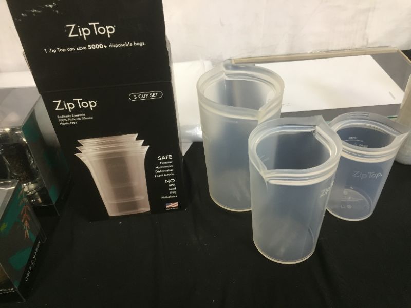 Photo 1 of Zip Top Reusable 100% Platinum Silicone Container - 3 Cup Set (S/M/L) - Teal