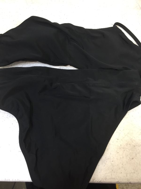 Photo 1 of two piece strapless bathing suit color black size small 