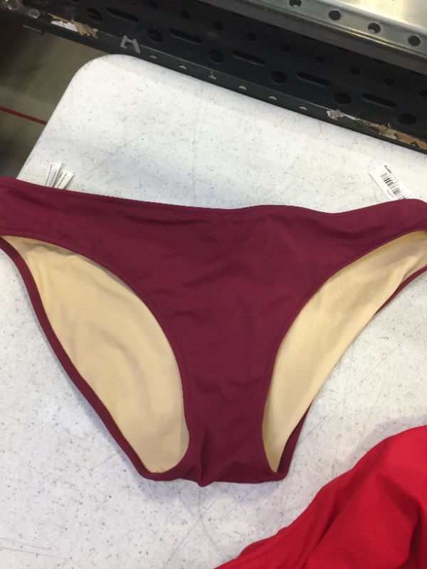 Photo 1 of womens underwear bottoms color red and burgundy one small one medium 