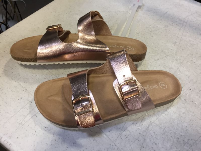 Photo 1 of girls sandals strap color brown and gold size 5 