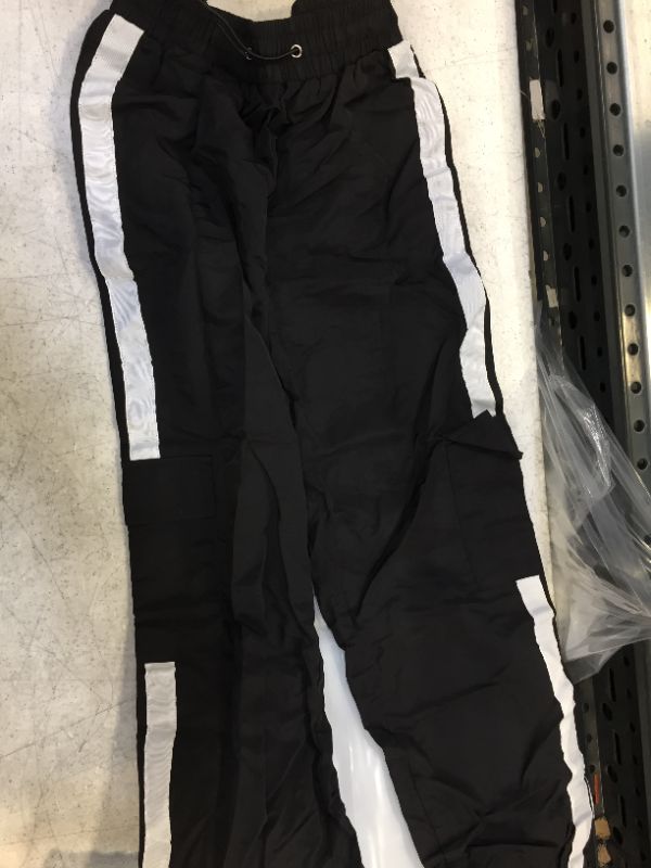 Photo 1 of womens small size jogging pants color black and white 
